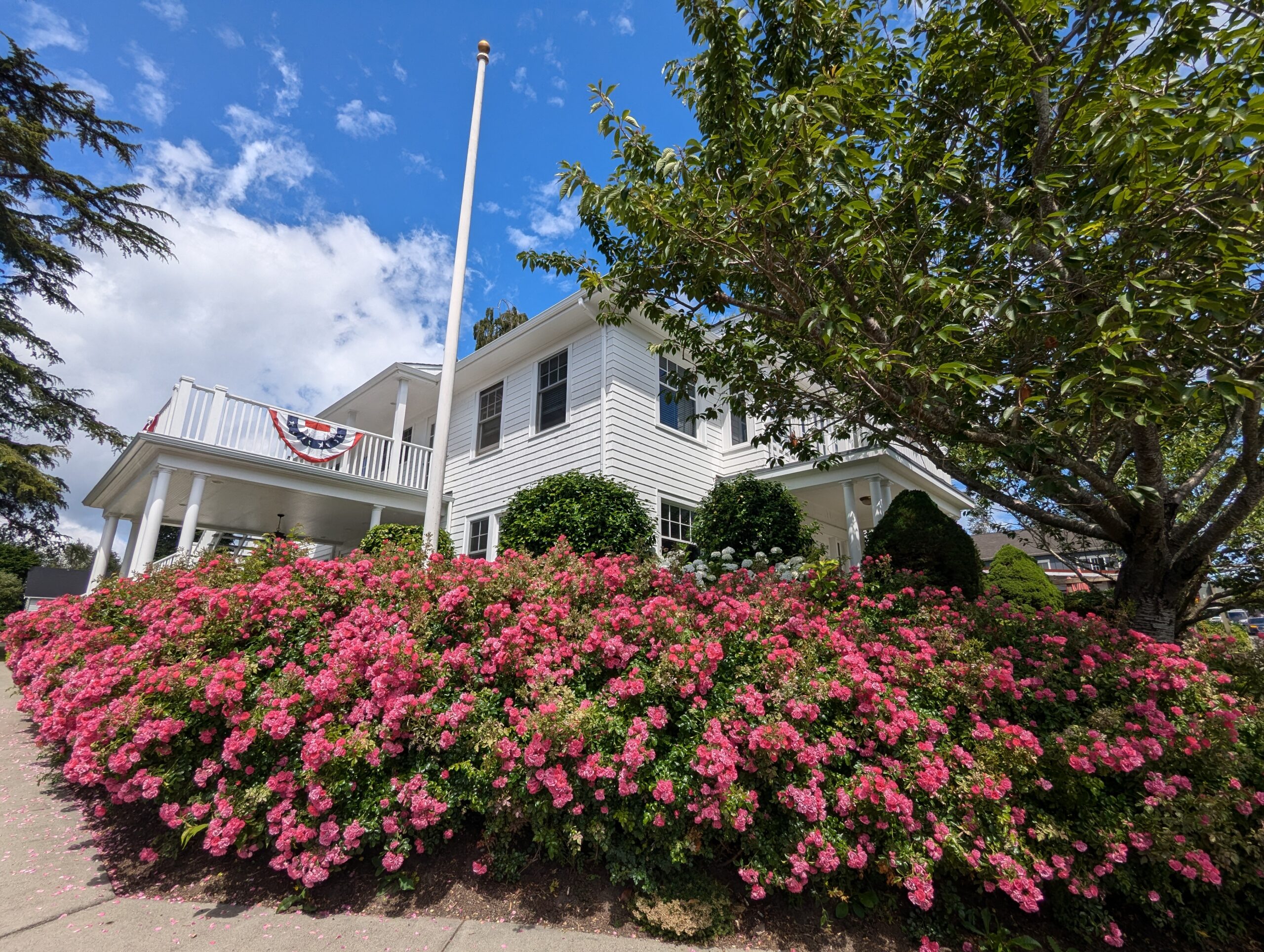 West Sound Injury Law Office Building with Roses in Front on Bainbridge Island